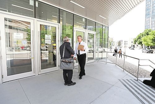 \RUTH BONNEVILLE / WINNIPEG FREE PRESS

Local - Accused Ste. Anne doctor Arcel Bissonnette, talks to his lawyer, Marty Minuk,  just outside the Law Courts Building on Monday.  



June 27th, 2022
