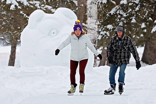 25012023
Colleen and Greg Krisko skate snow sculptures along the skating trail in Wasagaming at Riding Mountain National Park on a mild Wednesday afternoon. 
(Tim Smith/The Brandon Sun)