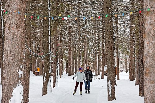 25012023
Colleen and Greg Krisko skate through the trees on the skating trail at Riding Mountain National Park on a mild Wednesday afternoon. 
(Tim Smith/The Brandon Sun)