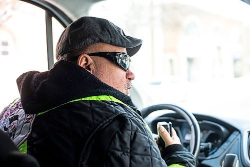 MIKAELA MACKENZIE / WINNIPEG FREE PRESS

Kevin Walker (Bear Clan executive director) drives the Bear Clan van during a search and awareness campaign for Ashlee Shingoose in the West End in Winnipeg on Wednesday, Jan. 25, 2023. For Chris story.

Winnipeg Free Press 2023.