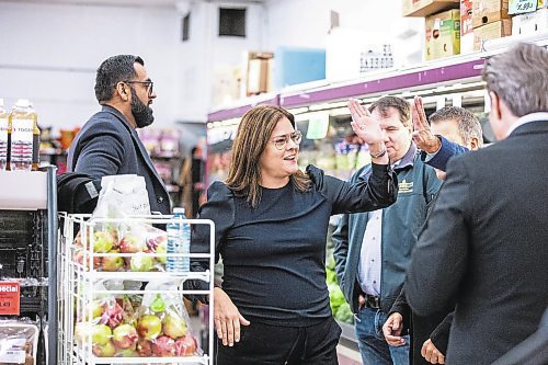 MIKAELA MACKENZIE / WINNIPEG FREE PRESS

Premier Heather Stefanson high fives fellow PC MLAs before announcing a new carbon tax relief fund at a press conference at Food Fare in Winnipeg on Thursday, Jan. 26, 2023. For Danielle story.

Winnipeg Free Press 2023.