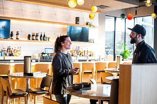 MIKAELA MACKENZIE / WINNIPEG FREE PRESS

Arts reporter Eva Wasney interviews chef Mike de Groot at Gather Craft Kitchen &amp; Bar at The Leaf in Winnipeg on Wednesday, Jan. 25, 2023. For Eva story.

Winnipeg Free Press 2023.