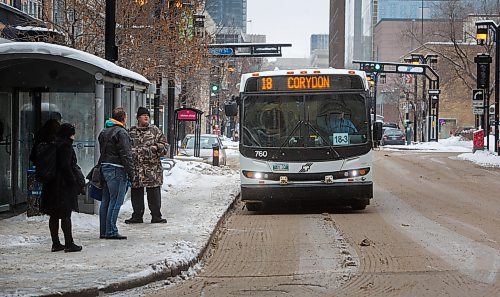 MIKE DEAL / WINNIPEG FREE PRESS
A Winnipeg Transit bus drives along Graham Avenue Thursday afternoon.
230126 - Thursday, January 26, 2023.