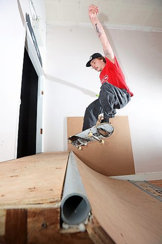 26012023
Taber Collens, owner of Recovery Skateshop on Rosser Avenue, skates a ramp in the back of the shop on Thursday afternoon. Recovery is taking bookings for the ramp, which gives the local skateboard community a place to keep in practice throughout the winter. (Tim Smith/The Brandon Sun)