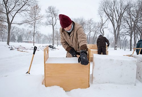 JESSICA LEE / WINNIPEG FREE PRESS

Owen Swendrowski-Yerex smoothes over the top of the block of snow he packed to build a fort at St. John&#x2019;s Park on January 26, 2023. The group is running a winter sports equipment library for anyone who wishes to experience the outdoors.

Reporter: AV Kitching