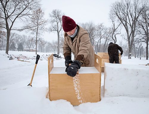 JESSICA LEE / WINNIPEG FREE PRESS

Owen Swendrowski-Yerex smoothes over the top of the block of snow he packed to build a fort at St. John&#x2019;s Park on January 26, 2023. The group is running a winter sports equipment library for anyone who wishes to experience the outdoors.

Reporter: AV Kitching