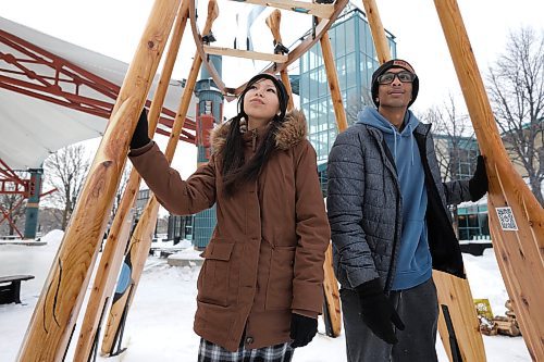 RUTH BONNEVILLE / WINNIPEG FREE PRESS
St. John's High School students, Kyree Perrault-Barkman, left, and Preston Moodley with their warming hut design named Azhe’O, which means ‘to paddle backwards’ in Ojibwe, at The Forks Friday.