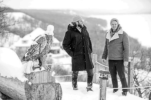 MIKAELA MACKENZIE / WINNIPEG FREE PRESS

Brett Sheffield (left) and Justin LeBlanc pose for a photo at the viewpoint (where they will host sunset yoga in the future) on the the Castleview Developments property, a 104 acre lot on Pelican Lake, in Manitoba on Tuesday, Jan. 24, 2023. They are planning on creating cabins, a wedding venue/corporate retreat, trails, and other amenities. Winnipeg Free Press 2023.