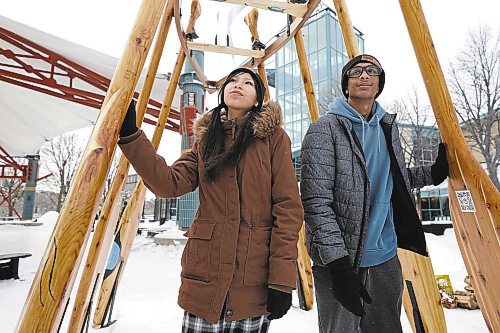 RUTH BONNEVILLE / WINNIPEG FREE PRESS 

ENT - warming huts

Photo of St. John's High School students, Kyree Perrault brown jacket) and Preston Moodley next to Azhe'O, the warming hut, which means &quot;to paddle backwards&quot; in Ojibwe, situated next to the skating canopy at the Forks.  

Perrault and Moodley along with a group of students and teachers from the school, worked together on the concept, design and construction of the hut. Their design was selected in the Warming Huts v.2023: An Arts + Architecture Competition on Ice which received 122 submissions from 33 countries. It is one of six new designs that will soon join old favourites on the Nestaweya River Trail at the Forks. 

Story: The Forks opens its annual showcase of award-winning warming hut designs along the Red and Assiniboine River this weekend.  This year's creations include local and international teams and bring to life six innovative new Warming Huts during building blitz week. Winnipeggers will soon enjoy the public art additions to the Nestaweya River Trail presented by The Winnipeg Foundation as they join Warming Huts from years past. 

See Alan's story. 

Jan 27th,  2023