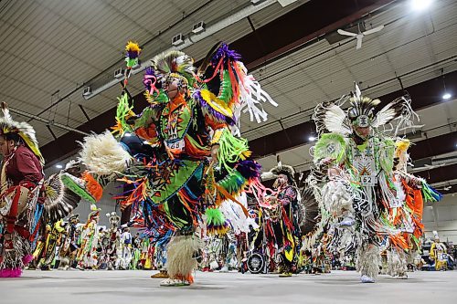 Dancers take part in the powwow grand entry at the Dakota Nation Winterfest at the Keystone Centre on Friday evening. (Tim Smith/The Brandon Sun)