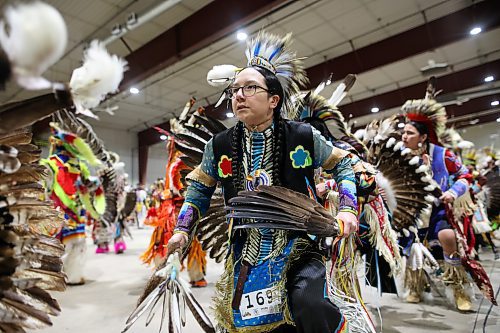 Dancers take part in the powwow grand entry at the Dakota Nation Winterfest at the Keystone Centre on Friday evening. After cancellations in 2021 and 2022 due to the COVID-19 pandemic, the annual event is back in the wheat city until Sunday and features a powwow, a talent show, hockey, volleyball and basketball tournaments, and much more. 
(Tim Smith/The Brandon Sun)