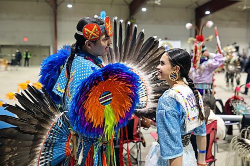 Elijah Waditaka and Delphine Zorthian visit at the Dakota Nation Winterfest at the Keystone Centre on Friday evening. (Tim Smith/The Brandon Sun)