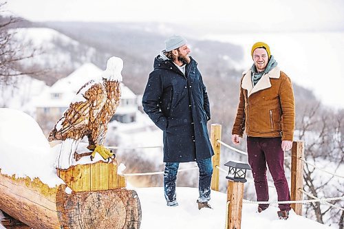 MIKAELA MACKENZIE / WINNIPEG FREE PRESS

Brett Sheffield (left) and Justin LeBlanc pose for a photo at the viewpoint (where they will host sunset yoga in the future) on the the Castleview Developments property, a 104 acre lot on Pelican Lake, in Manitoba on Tuesday, Jan. 24, 2023. They are planning on creating cabins, a wedding venue/corporate retreat, trails, and other amenities. Winnipeg Free Press 2023.