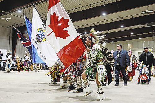 27012022
Dancers and dignitaries take part in the powwow grand entry at the Dakota Nation Winterfest at the Keystone Centre on Friday evening. After cancellations in 2021 and 2022 due to the COVID-19 pandemic, the annual event is back in the wheat city until Sunday and features a powwow, a talent show, hockey, volleyball and basketball tournaments, and much more. 
(Tim Smith/The Brandon Sun)