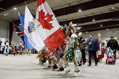 27012022
Dancers and dignitaries take part in the powwow grand entry at the Dakota Nation Winterfest at the Keystone Centre on Friday evening. After cancellations in 2021 and 2022 due to the COVID-19 pandemic, the annual event is back in the wheat city until Sunday and features a powwow, a talent show, hockey, volleyball and basketball tournaments, and much more. 
(Tim Smith/The Brandon Sun)