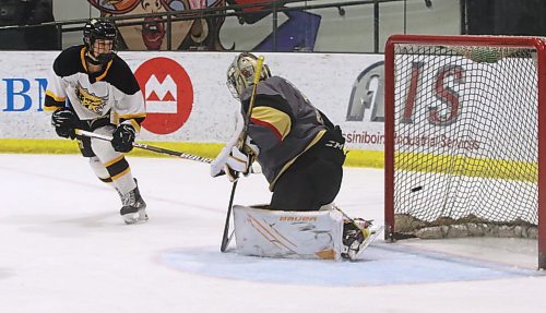 Brandon Wheat Kings forward Jackson Keeble tips a shot past Westman Ice Bandits goalie Connor Rapley during second period action at J&G Homes Arena on Saturday afternoon. Brandon trailed 2-0 before exploding for seven goals in a 7-3 victory in a battle of the regional rivals. (Perry Bergson/The Brandon Sun)