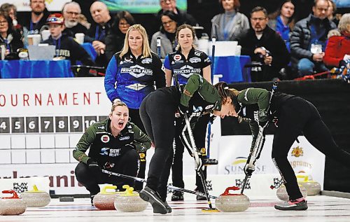 JOHN WOODS / WINNIPEG FREE PRESS
Skip Jennifer Jones, background left, looks on as Abby Ackland, third, calls out to her sweepers in the Scotties Tournament of Hearts at East St Paul Arena Sunday, January 29, 2023. Jennifer Jones defeated skip Meghan Walter and team Ackland and will represent Manitoba.

Re: sawatzki