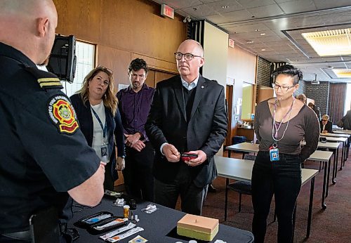 JESSICA LEE / WINNIPEG FREE PRESS
Cory Guest, Education Coordinator with Winnipeg Paramedic Service, teaches members of City Council, including Mayor Scott Gillingham, on how to administer naloxone at City Hall on January 30, 2023.
Reporter: Malak Abas
