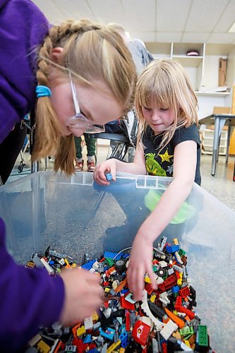 MIKE DEAL / WINNIPEG FREE PRESS
Starbuck School students playing with lego during the noon-hour Lego Club, (l-r) Jaidyn Smart, and Ella Milne.
Tim Morison, phys-ed teacher at Starbuck School in Starbuck, MB, found in Lego an unlikely cure to workplace burnout and mental health challenges, which began after months of teaching during a pandemic and worsened when he and his wife lost their baby in the spring. Morison opened up to his students about his mental health struggles and shared his coping mechanism: building Lego with his three-year-old at home and alone, with them. His students&#x560;receptiveness has since sparked the launch of a Lego club at Starbuck School. On Mondays and Tuesdays, the phys-ed teacher forfeits his lunch hour to spend time with K-8 students and colourful blocks. They&#x576;e done significant fundraising to purchase toys and accepted donations from community members.
See Maggie Macintosh story
230130 - Monday, January 30, 2023.