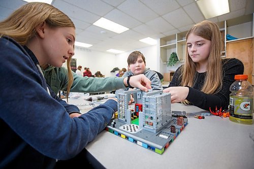 MIKE DEAL / WINNIPEG FREE PRESS
Starbuck School students playing with lego during the noon-hour Lego Club, (l-r) Emily Manaigre, Abby Zulyniak, Nicholas Lyssiakov, and Sara Fossay.
Tim Morison, phys-ed teacher at Starbuck School in Starbuck, MB, found in Lego an unlikely cure to workplace burnout and mental health challenges, which began after months of teaching during a pandemic and worsened when he and his wife lost their baby in the spring. Morison opened up to his students about his mental health struggles and shared his coping mechanism: building Lego with his three-year-old at home and alone, with them. His students&#x560;receptiveness has since sparked the launch of a Lego club at Starbuck School. On Mondays and Tuesdays, the phys-ed teacher forfeits his lunch hour to spend time with K-8 students and colourful blocks. They&#x576;e done significant fundraising to purchase toys and accepted donations from community members.
See Maggie Macintosh story
230130 - Monday, January 30, 2023.