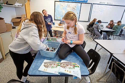 MIKE DEAL / WINNIPEG FREE PRESS
Starbuck School students playing with lego during the noon-hour Lego Club, (l-r) Jaidyn Smart, Lux Deschamps, and Vasiliki Storozuk.
Tim Morison, phys-ed teacher at Starbuck School in Starbuck, MB, found in Lego an unlikely cure to workplace burnout and mental health challenges, which began after months of teaching during a pandemic and worsened when he and his wife lost their baby in the spring. Morison opened up to his students about his mental health struggles and shared his coping mechanism: building Lego with his three-year-old at home and alone, with them. His students&#x560;receptiveness has since sparked the launch of a Lego club at Starbuck School. On Mondays and Tuesdays, the phys-ed teacher forfeits his lunch hour to spend time with K-8 students and colourful blocks. They&#x576;e done significant fundraising to purchase toys and accepted donations from community members.
See Maggie Macintosh story
230130 - Monday, January 30, 2023.
