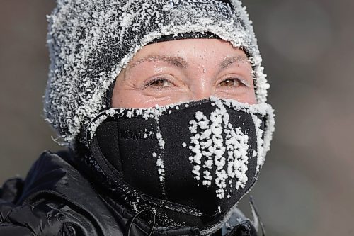 RUTH BONNEVILLE / WINNIPEG FREE PRESS 

Standup - frosty run

Avid runner Trish Hunter doesn't mind the cold weather or the frost buildup on her face mask and eyelashes as she makes her way down Wellington Crescent during her daily running routine Tuesday.



Jan 31st,  2023