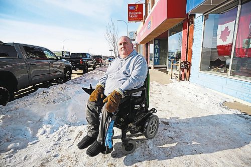 MIKE DEAL / WINNIPEG FREE PRESS
Tom Jones is a wheelchair user and thinks the bare pavement pilot project is a great idea and the city should make that level of clearing its standard for all sidewalks.
See Joyanne Pursaga story
230131 - Tuesday, January 31, 2023