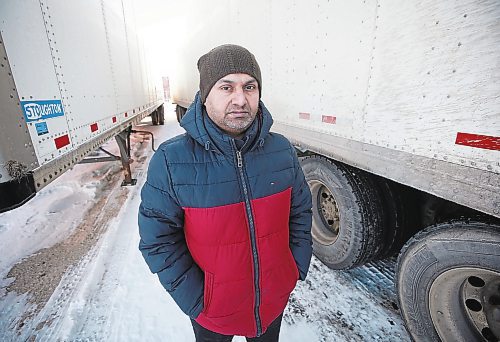 JOHN WOODS / WINNIPEG FREE PRESS
Paul Brar, truck yard co-owner, is photographed with some of his remaining trailers Tuesday, January 31, 2023. Brar alleges that 7 of his 9 semi-trucks were intentionally destroyed in a fire, causing $7 million in damages.

Re: Abas