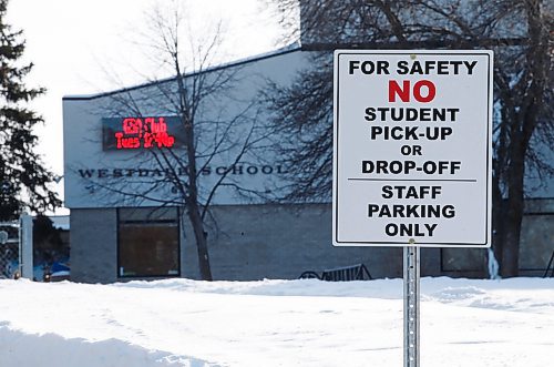 JOHN WOODS / WINNIPEG FREE PRESS
Signage is used to discourage people from using the school parking lot to pick up their students at Westdale School on Betsworth Avenue  Tuesday, January 31, 2023. Student drop-offs and pick-ups can be difficult and dangerous at some schools in the city.

Re: macintosh