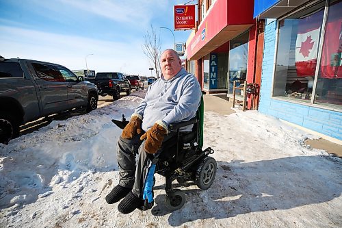 MIKE DEAL / WINNIPEG FREE PRESS
Tom Jones is a wheelchair user and thinks the bare pavement pilot project is a great idea and the city should make that level of clearing its standard for all sidewalks.
See Joyanne Pursaga story
230131 - Tuesday, January 31, 2023