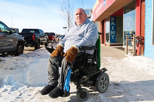 MIKE DEAL / WINNIPEG FREE PRESS
Tom Jones is a wheelchair user and thinks the bare pavement pilot project is a great idea and the city should make that level of clearing its standard for all sidewalks.
See Joyanne Pursaga story
230131 - Tuesday, January 31, 2023