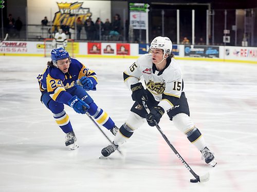 31012022
Nolan Ritchie #15 of the Brandon Wheat Kings looks to fire a shot on net as Tanner Molendyk #24 of the Saskatoon Blades tries to stop him during WHL action at Westoba Place on Tuesday evening. 
(Tim Smith/The Brandon Sun)