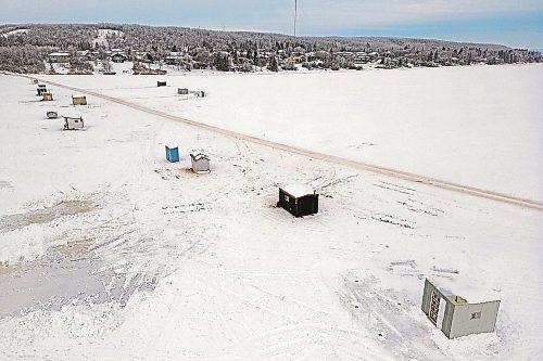 09012023
Ice-fishing shacks line the south end of Minnedosa Lake by the dam on a grey Monday.
(Tim Smith/The Brandon Sun)