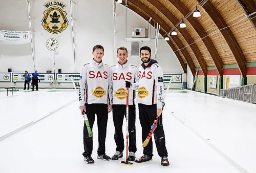 JESSICA LEE / WINNIPEG FREE PRESS

From left to right: Ryan Wiebe , Adam Flatt and Ty Dilello pose for a photo at Fort Rouge Curling Club on February 1, 2023.

Reporter: Taylor Allen