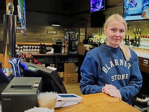 Liana Misinova fled Ukraine with her two children to start build a new life in Canada. Also assisted by Pauls, she currently works at the Blarney Stone. (Ian Hitchen/Brandon Sun)