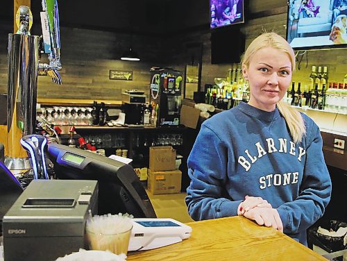 Liana Misinova fled Ukraine with her two children to start build a new life in Canada. Also assisted by Pauls, she currently works at the Blarney Stone. (Ian Hitchen/Brandon Sun)