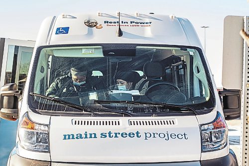 MIKAELA MACKENZIE / WINNIPEG FREE PRESS

Peer advocate Tara (right) leans over to help a support worker track items given out from the Main Street Project van in Winnipeg on Wednesday, Feb. 1, 2023. For Tyler story.

Winnipeg Free Press 2023.