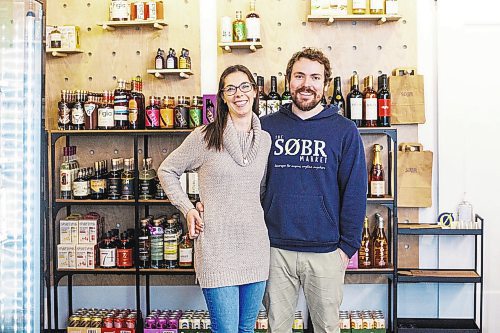 MIKAELA MACKENZIE / WINNIPEG FREE PRESS

Jessie and Shane Halliburton, co-owners of The Sobr Market, pose for a photo in their new store in the Exchange District in Winnipeg on Thursday, Feb. 2, 2023. For Gabby story.

Winnipeg Free Press 2023.