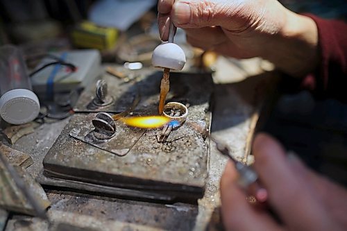 02022023
Longtime Brandon goldsmith Dat Tao works on refinishing a ring in his workshop at TCM Goldsmith in downtown Brandon. (Tim Smith/The Brandon Sun)
