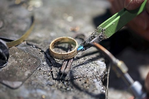 02022023
Longtime Brandon goldsmith Dat Tao works on refinishing a ring in his workshop at TCM Goldsmith in downtown Brandon. (Tim Smith/The Brandon Sun)
