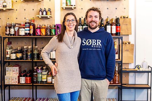 MIKAELA MACKENZIE / WINNIPEG FREE PRESS

Jessie and Shane Halliburton, co-owners of The Sobr Market, pose for a photo in their new store in the Exchange District in Winnipeg on Thursday, Feb. 2, 2023. For Gabby story.

Winnipeg Free Press 2023.