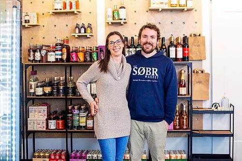 MIKAELA MACKENZIE / WINNIPEG FREE PRESS

Jessie and Shane Halliburton, co-owners of The Sobr Market, pose for a photo in their new store in the Exchange District in Winnipeg on Thursday, Feb. 2, 2023. For Gabby story.

Winnipeg Free Press 2023.