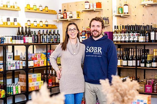 MIKAELA MACKENZIE / WINNIPEG FREE PRESS

Jessie and Shane Halliburton, co-owners of The Sobr Market, pose for a photo in their new store in the Exchange District in Winnipeg on Thursday, Feb. 2, 2023. For Gabby story.

Winnipeg Free Press 2023.