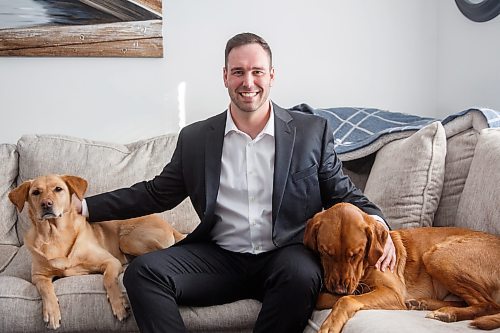 MIKE DEAL / WINNIPEG FREE PRESS
Ben Carr, at his home with his two golden retrievers, is seeking the Liberal nomination in Wpg South Centre, and hopes to replace his late father, Jim Carr, as the riding&#x2019;s Liberal MP.
See Carol Sanders story
230202 - Thursday, {month name} 02, 2023.