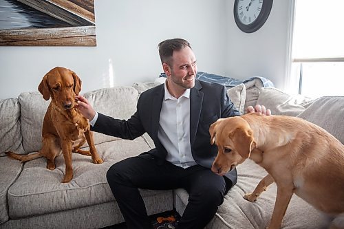 MIKE DEAL / WINNIPEG FREE PRESS
Ben Carr, at his home with his two golden retrievers, is seeking the Liberal nomination in Wpg South Centre, and hopes to replace his late father, Jim Carr, as the riding&#x2019;s Liberal MP.
See Carol Sanders story
230202 - Thursday, {month name} 02, 2023.