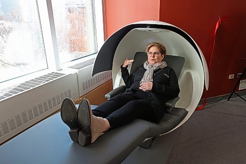 02022023
Marlene Heise, Director, Wealth, Insurance and Real Estate Services for Fusion Credit Union, demonstrates how to use an EnergyPod donated by Fusion Credit Union to Brandon University at the John E. Robbins Library on Thursday. The pod allows students and faculty to nap or rest in the library. (Tim Smith/The Brandon Sun)

