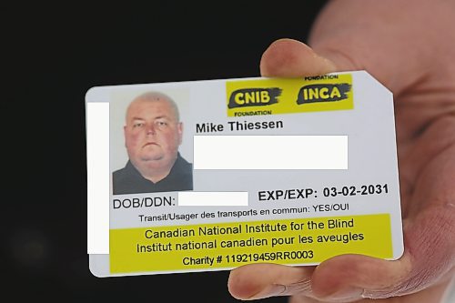 Brandon Sun Mike Thiessen's ID card issued by the Canadian National Institute for the Blind. (Drew May/The Brandon Sun)
