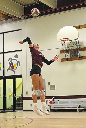 Jayde Hansen-Young attacks a ball during Assiniboine Community College women's volleyball practice on Friday. (Thomas Friesen/The Brandon Sun)