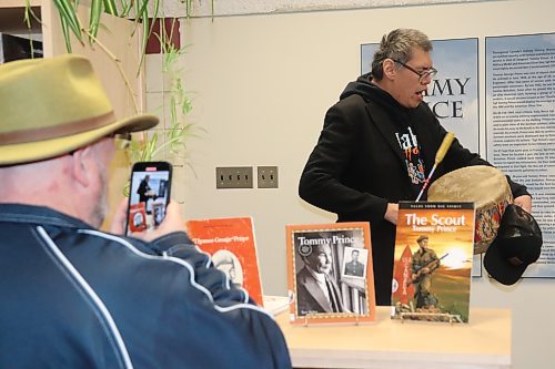 Sioux Valley Dakota Nation community member Glen Pratt performs an honour song during Friday's grand opening ceremony for the Tommy Prince Library at Crocus Plains Regional Secondary School. (Kyle Darbyson/The Brandon Sun)