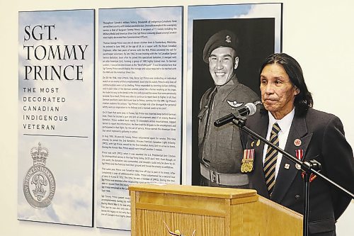 Tommy Prince Jr., the son of Indigenous war veteran Tommy Prince, addresses the crowd gathered at Crocus Plains Regional Secondary School on Friday for the official re-naming of the institution's library. (Kyle Darbyson/The Brandon Sun)